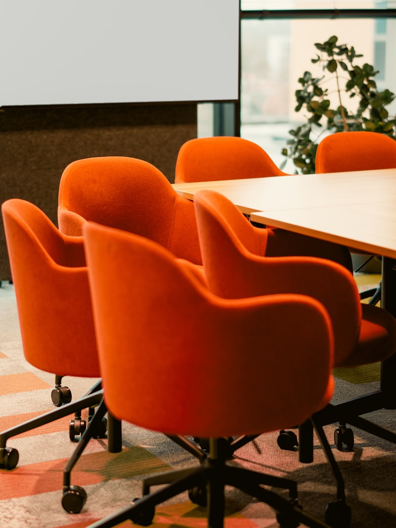 A conference room set with seating around a long table