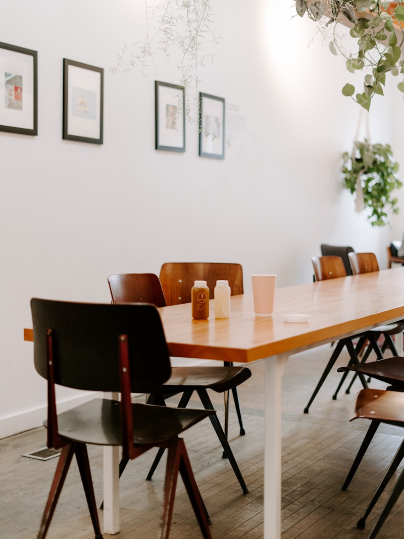 A warm executive dining room set for a working lunch