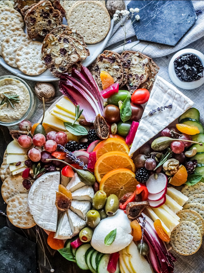 An abundant grazing display of fruit, cheese and charcuterie
