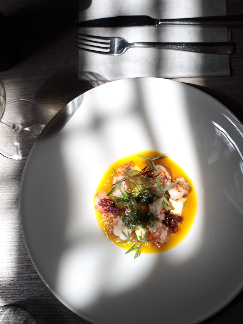 A plated main course presented on a dark plate