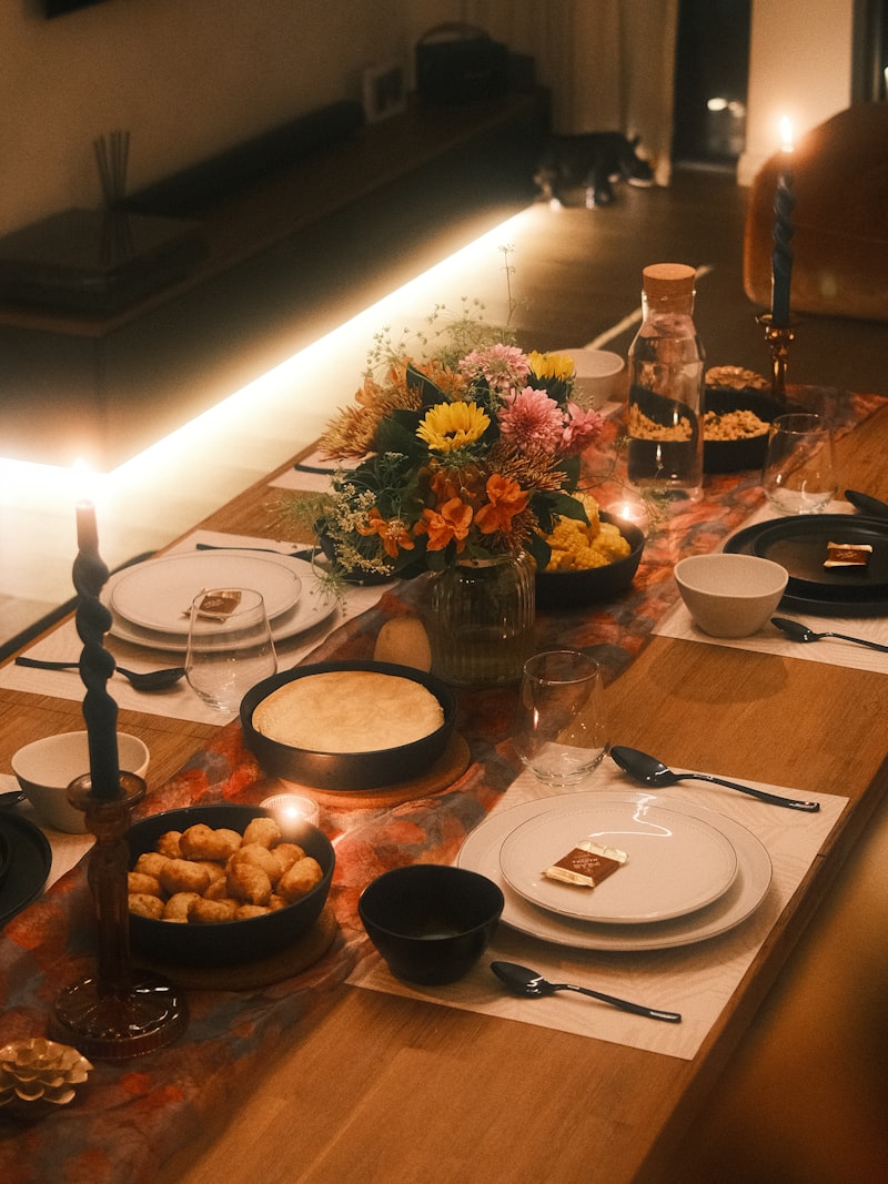 An intimate dinner table lit with candles
