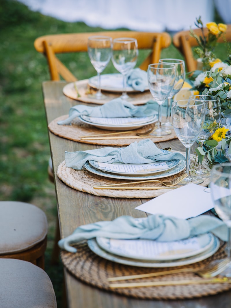 A place setting with a linen napkin, china and glassware