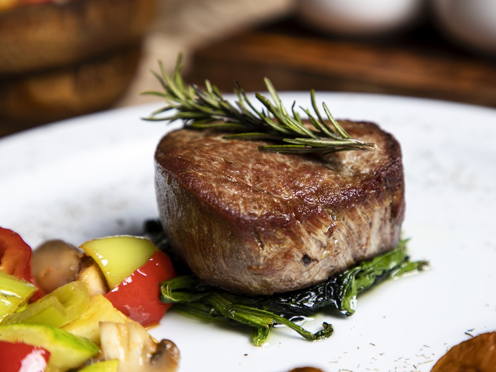A seared entrée finished with rosemary, shot close up